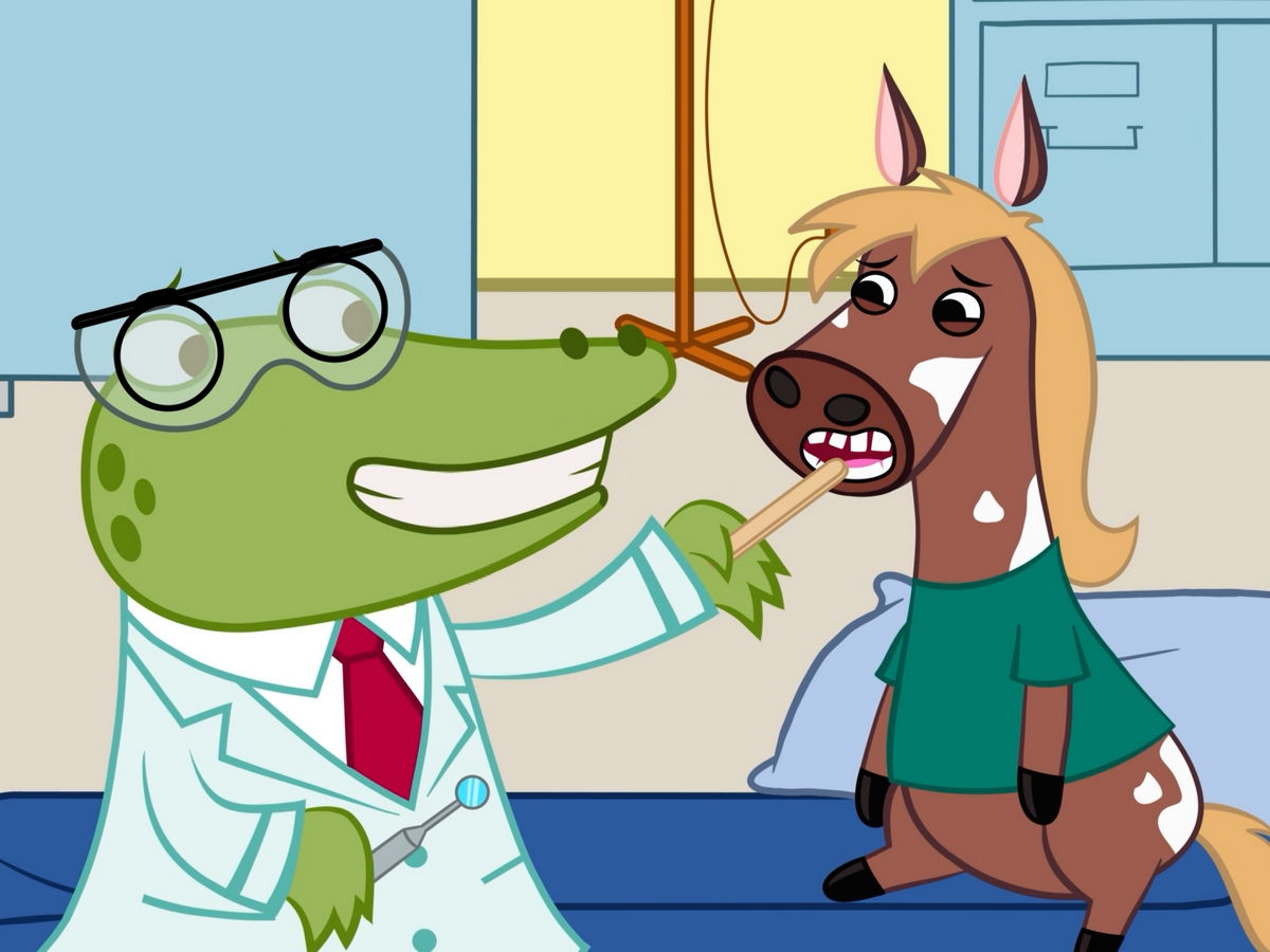 Croco Doc revisa un diente que se mueve.